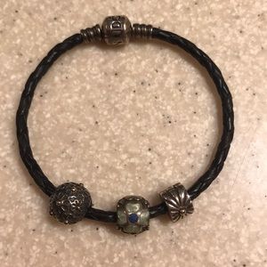 Pandora beaded leather bracelet and 3 charms.